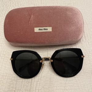 Miu Miu core collection black/gold cat eye sunglasses